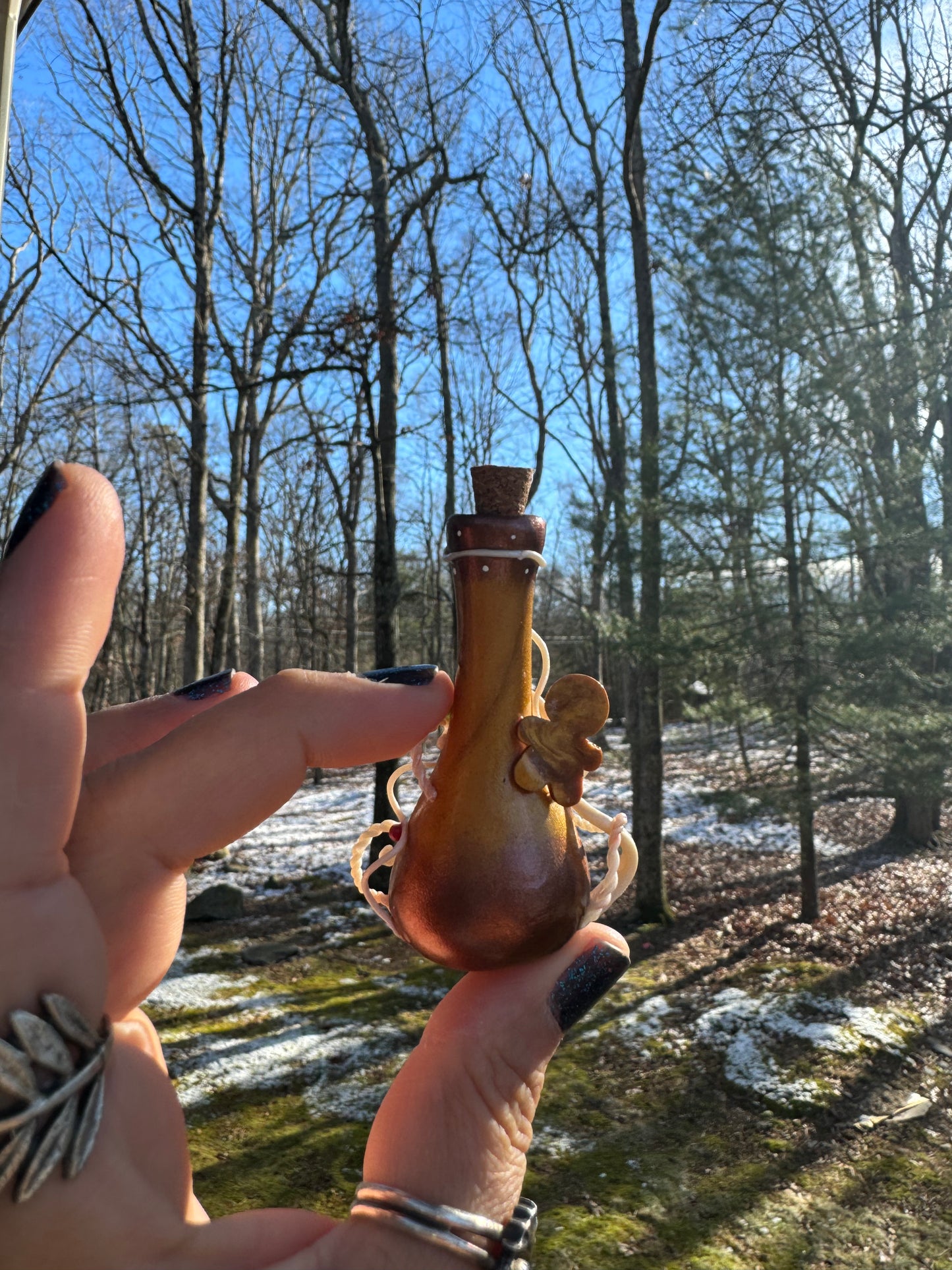 Sweet spellcaster potion bottle
