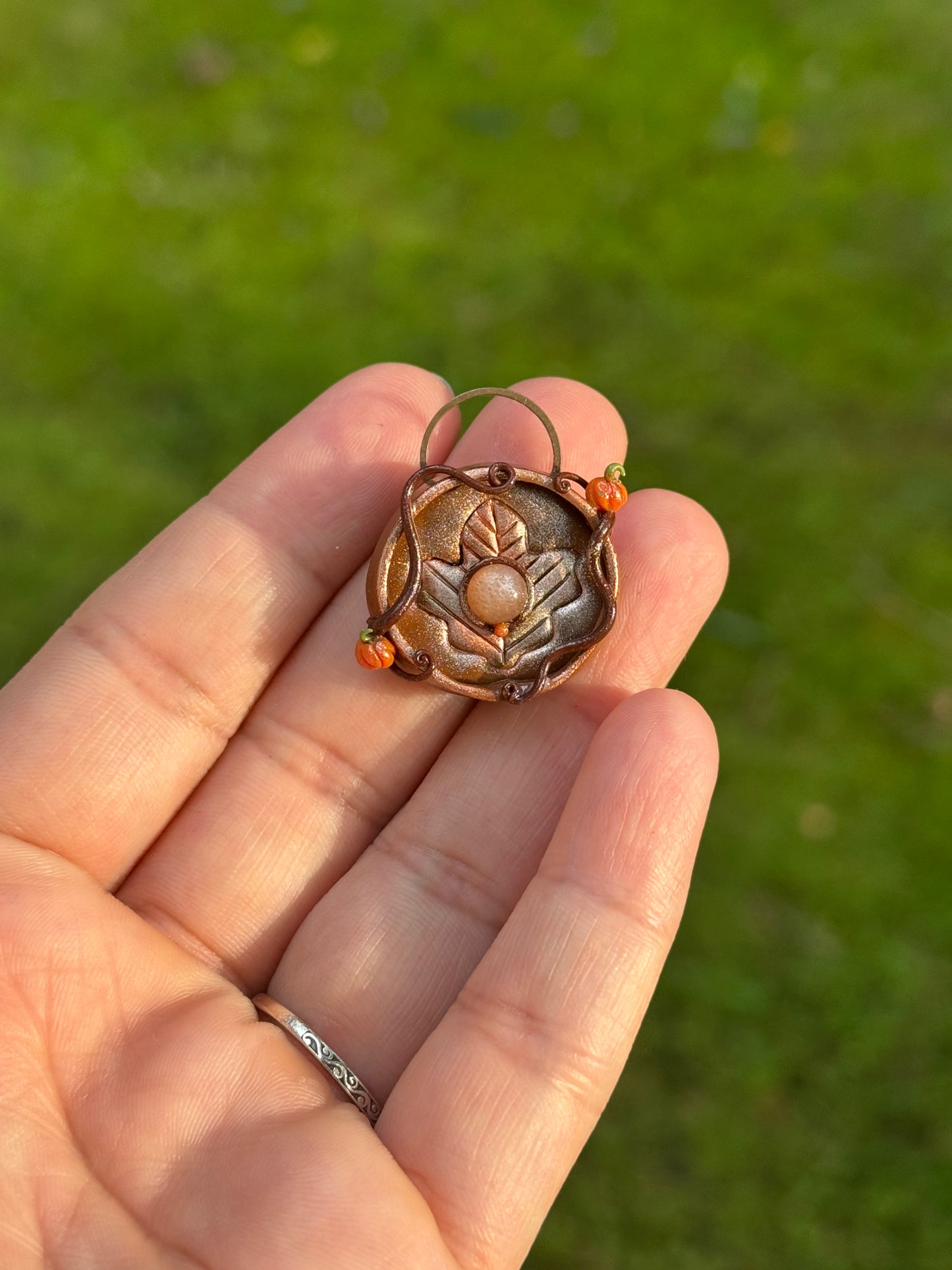 Maple leaf coin pendant