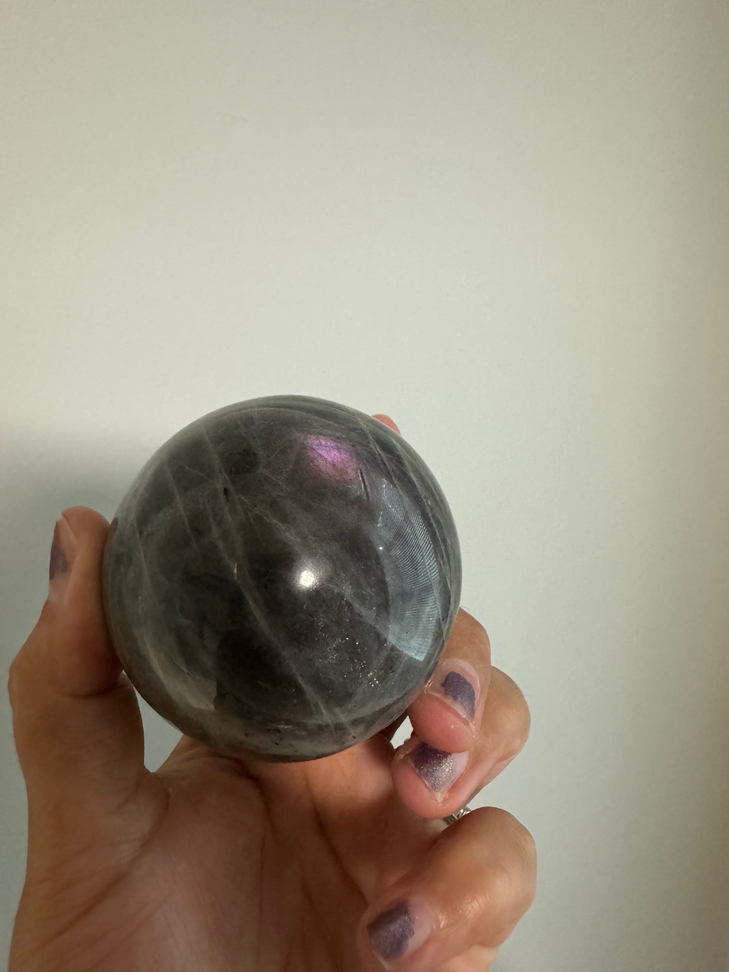 Purple and blue labradorite sphere