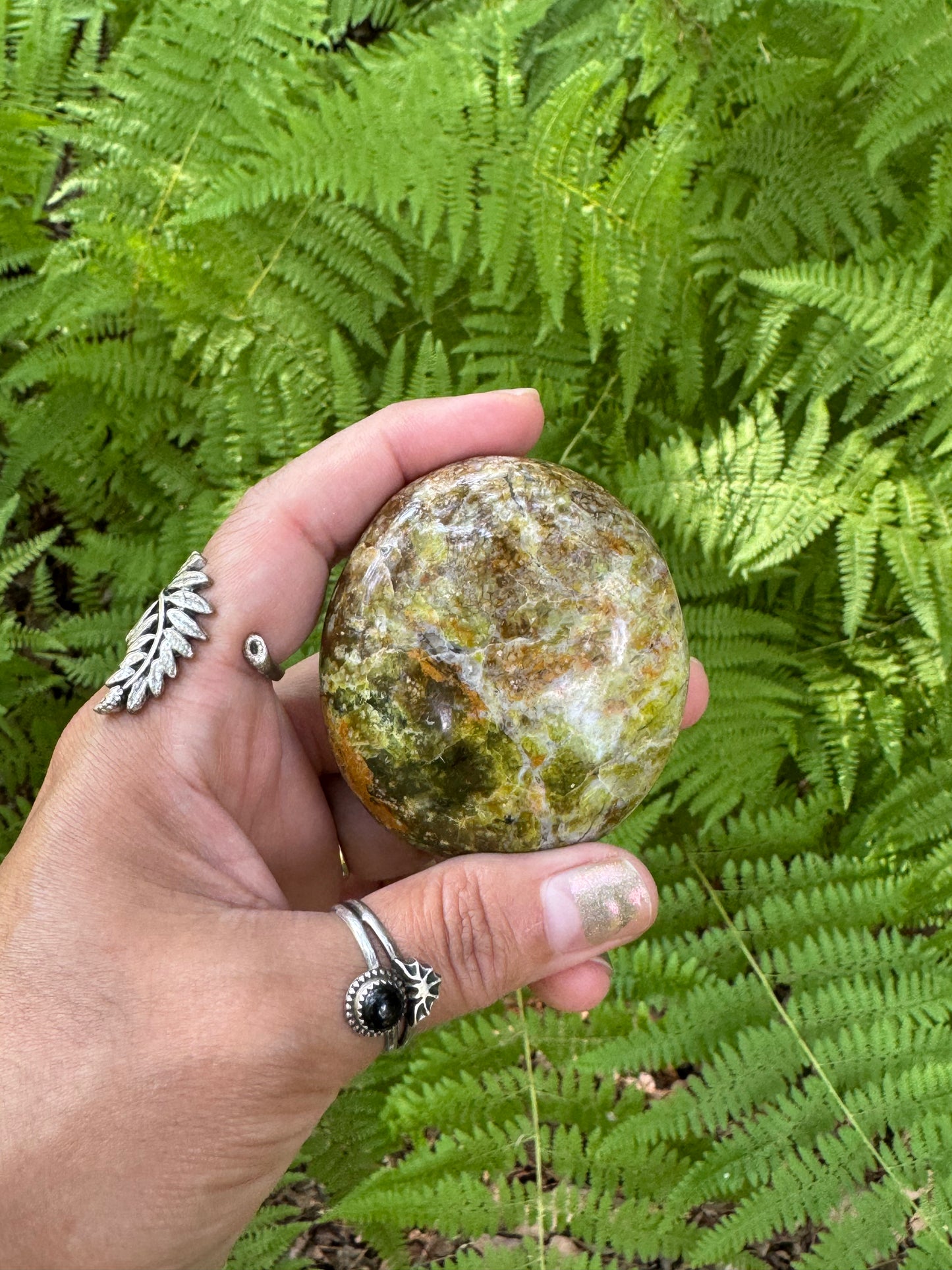 Green opal palm stone