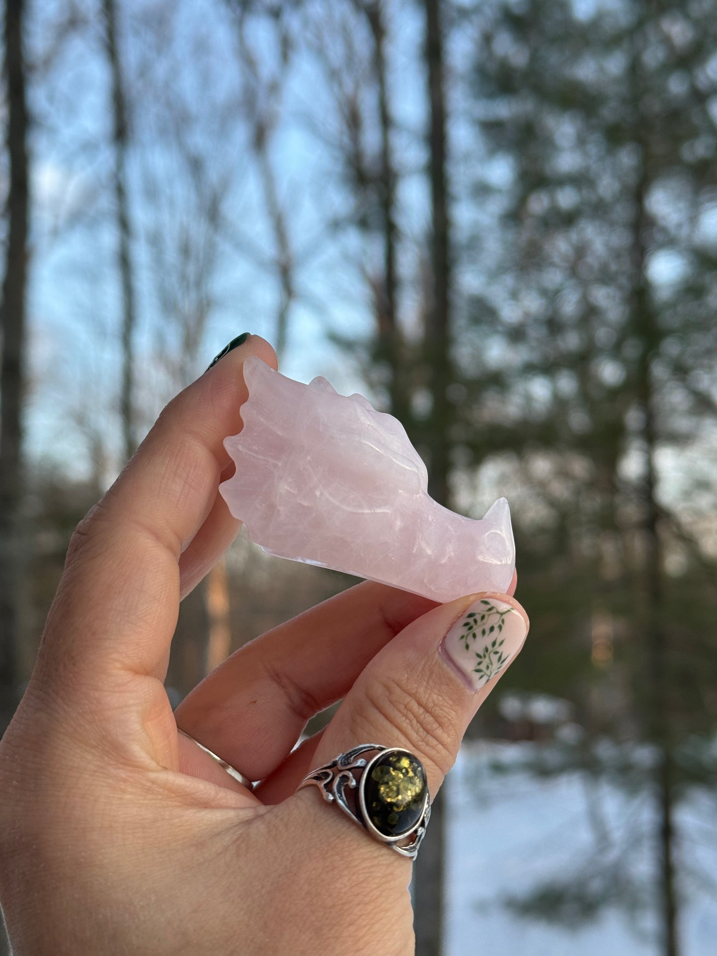 Rose quartz dragon head carving