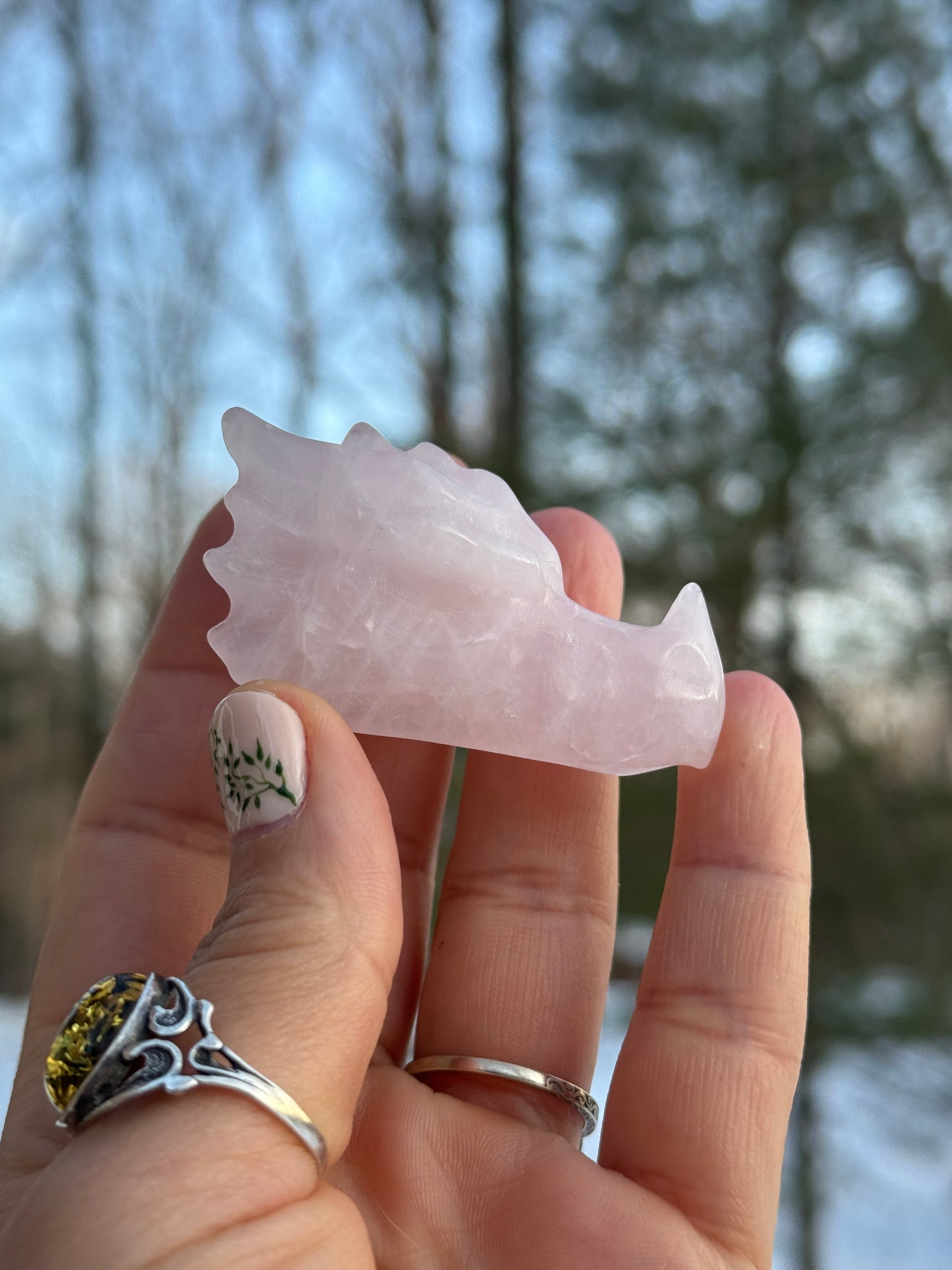 Rose quartz dragon head carving
