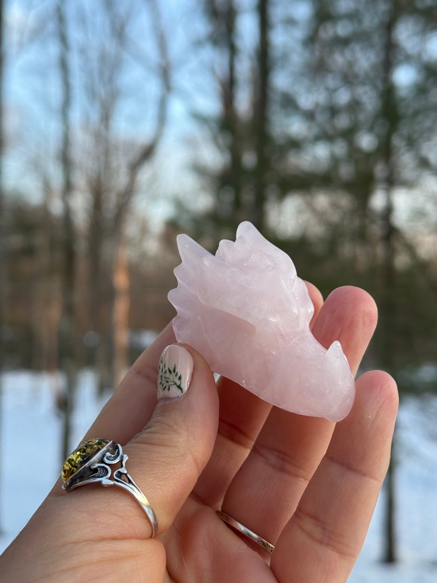 Rose quartz dragon head carving