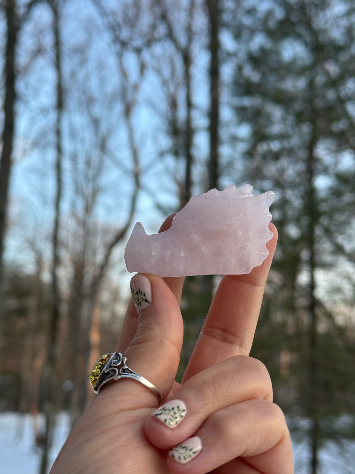 Rose quartz dragon head carving