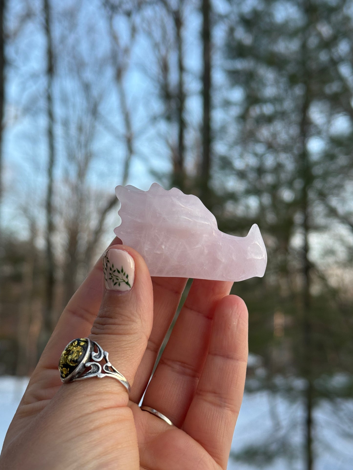 Rose quartz dragon head carving