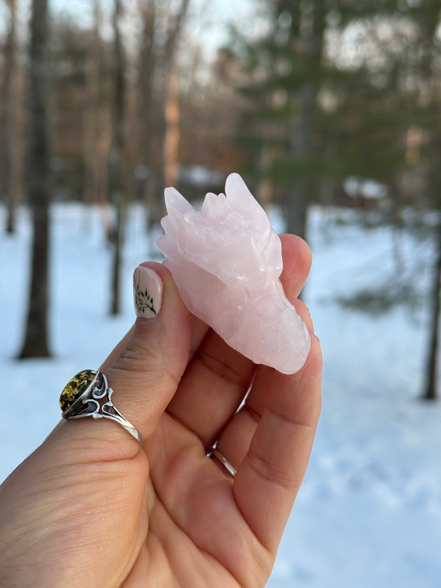 Rose quartz dragon head carving