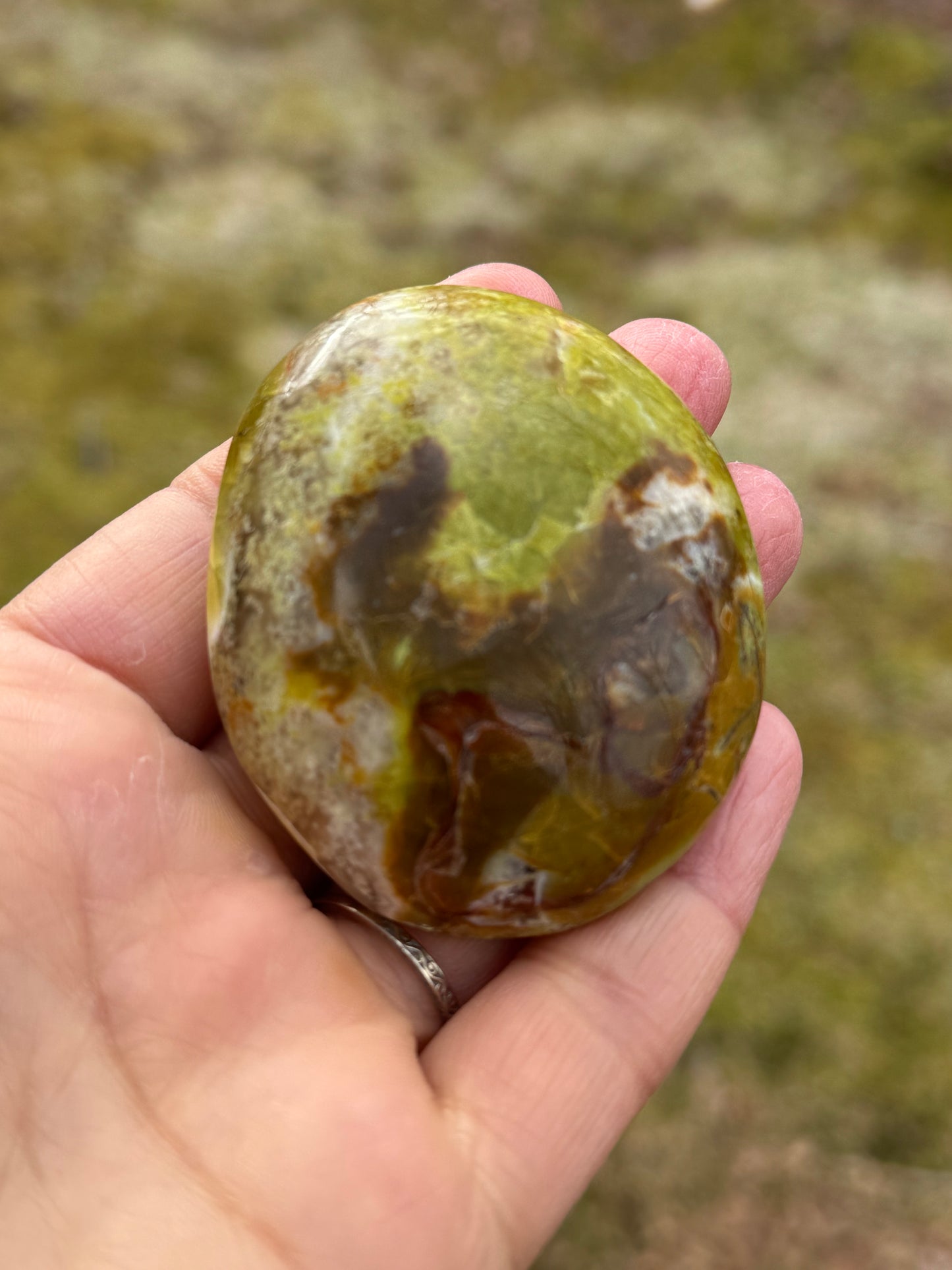 Green opal palm stone