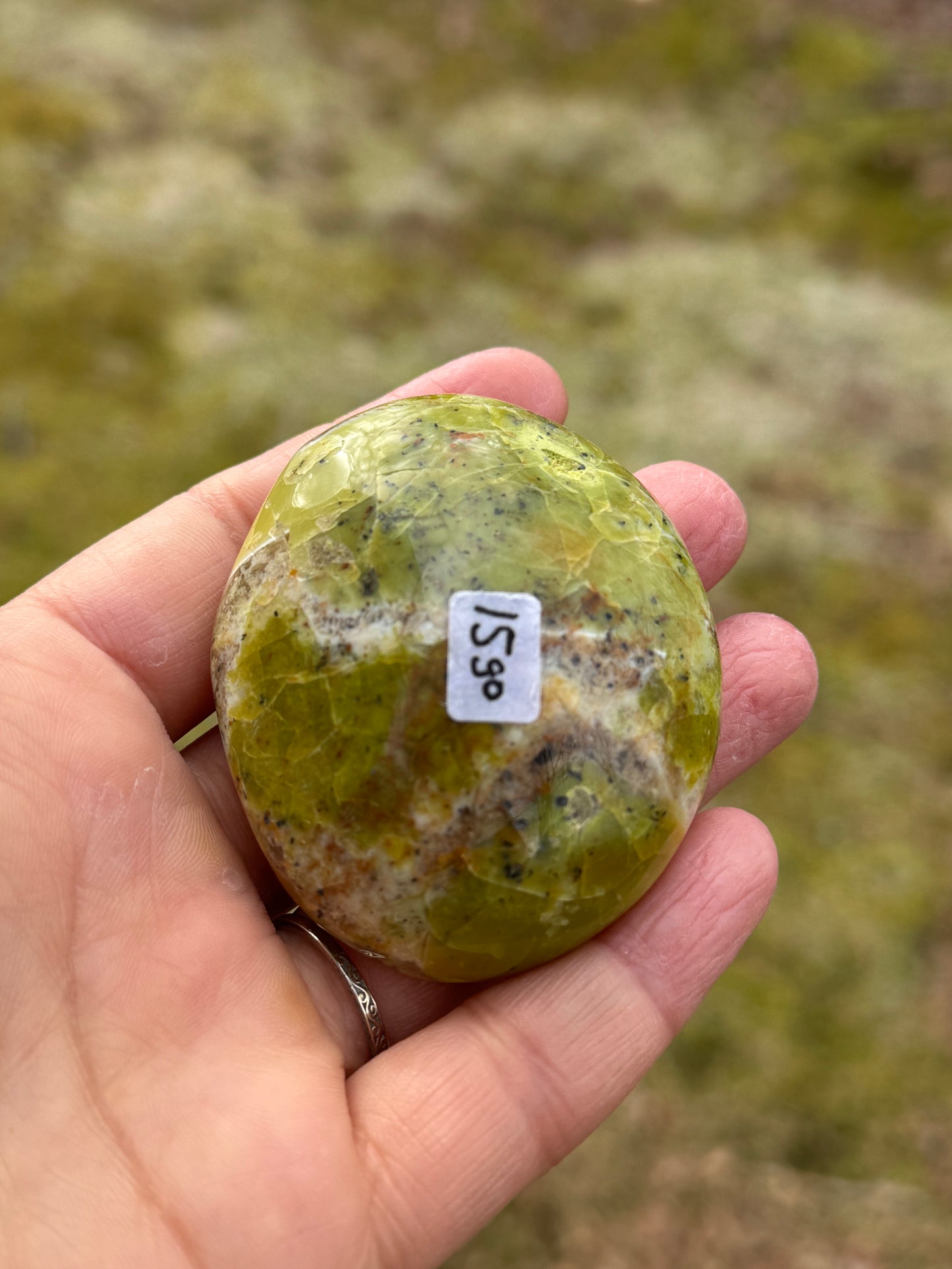Green opal palm stone