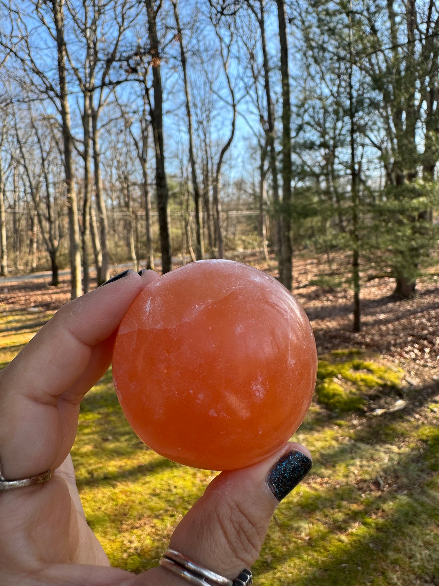 Orange selenite sphere