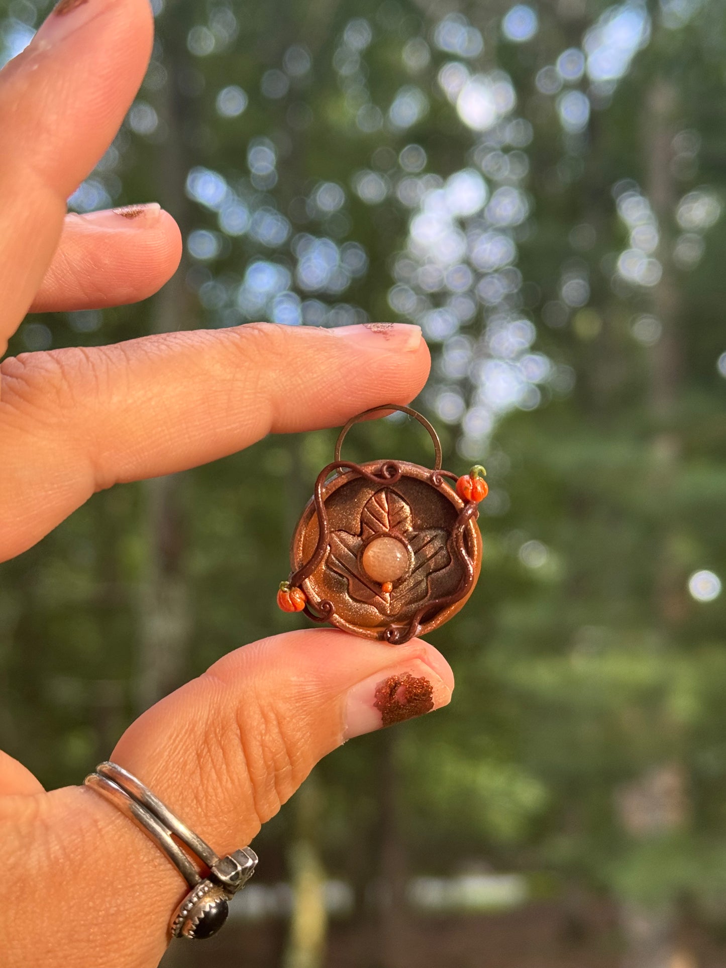 Maple leaf coin pendant