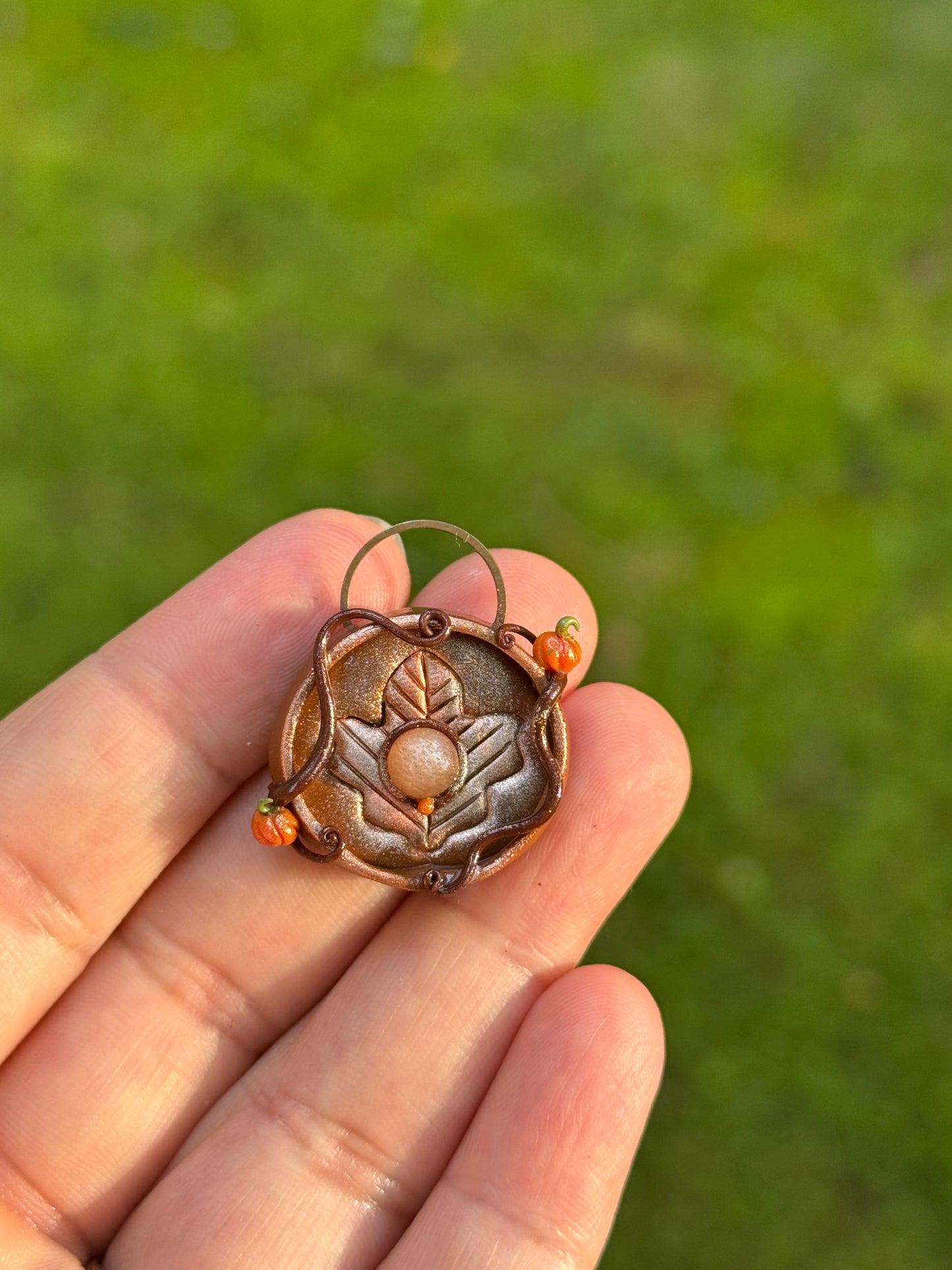 Maple leaf coin pendant