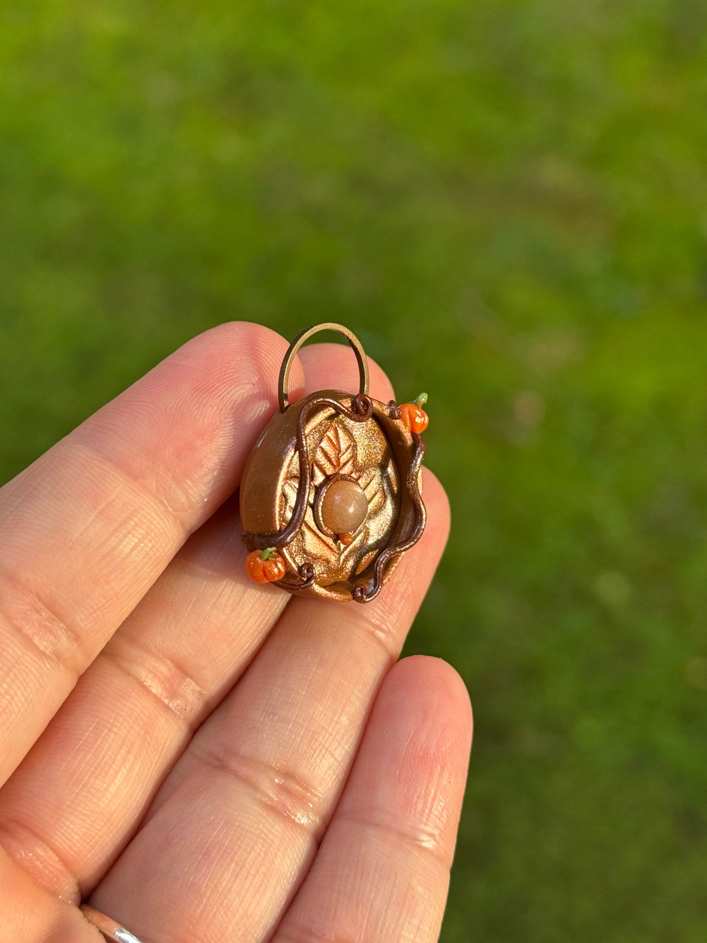 Maple leaf coin pendant
