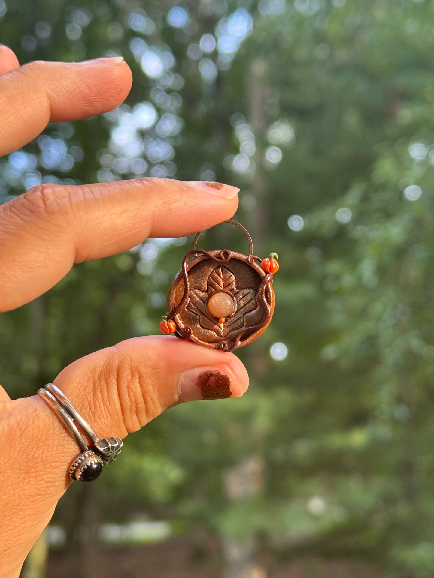 Maple leaf coin pendant