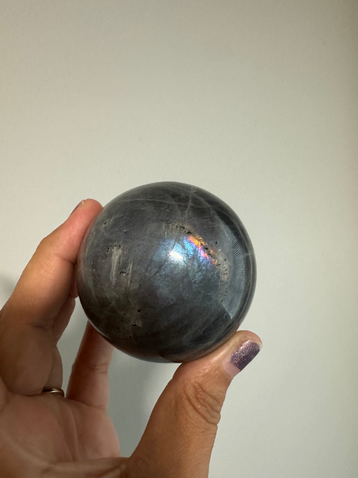 Purple and blue labradorite sphere