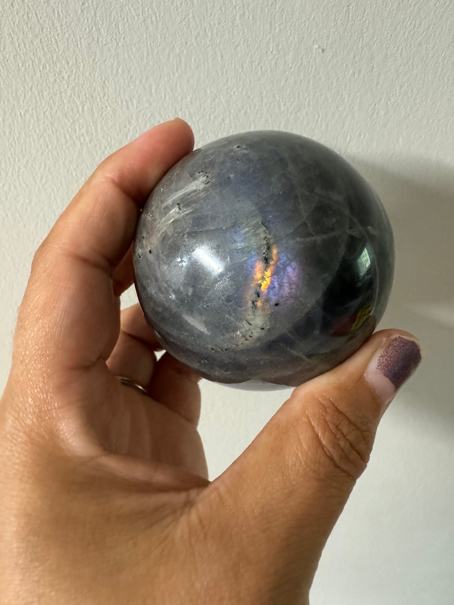 Purple and blue labradorite sphere