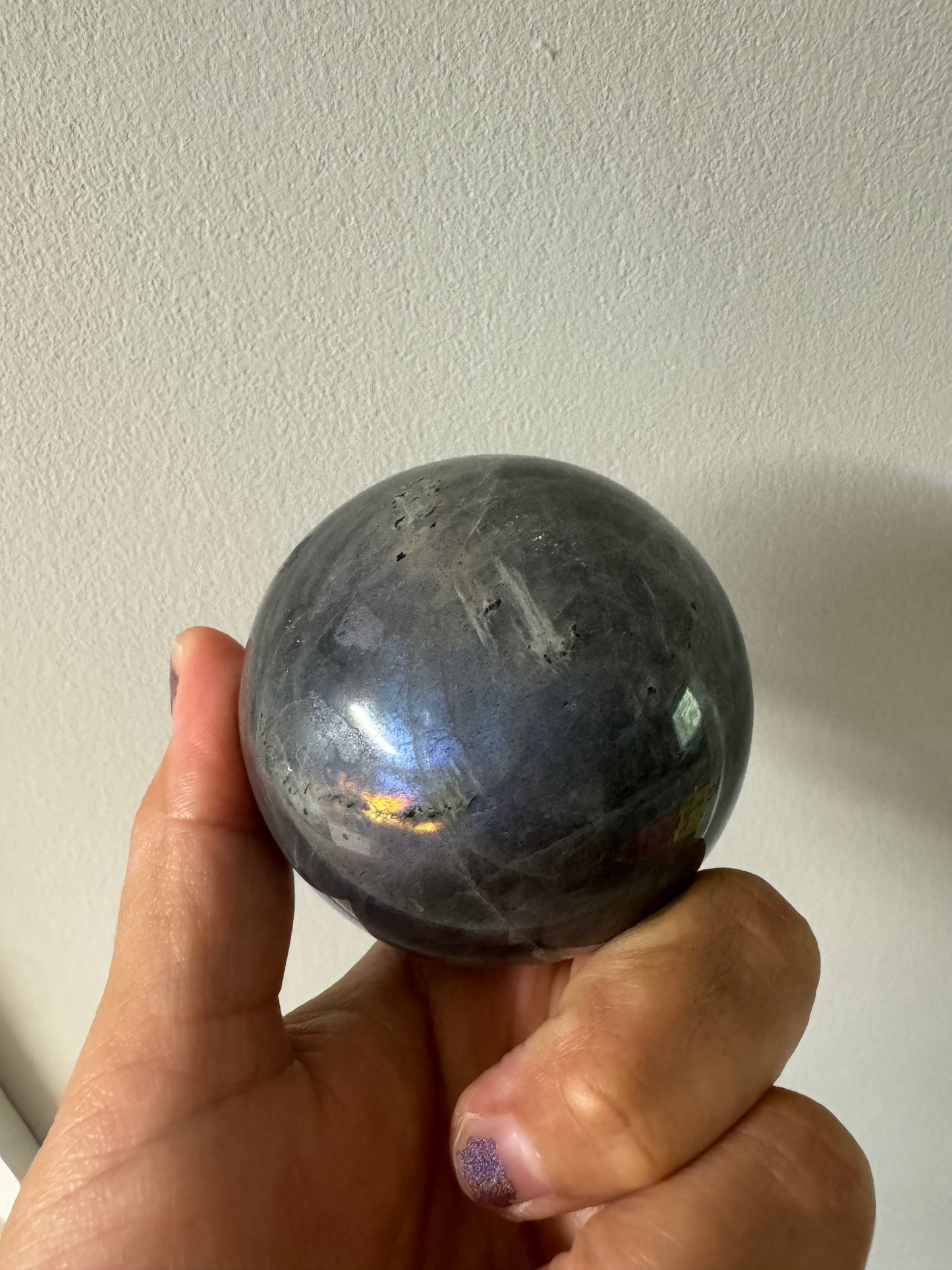 Purple and blue labradorite sphere