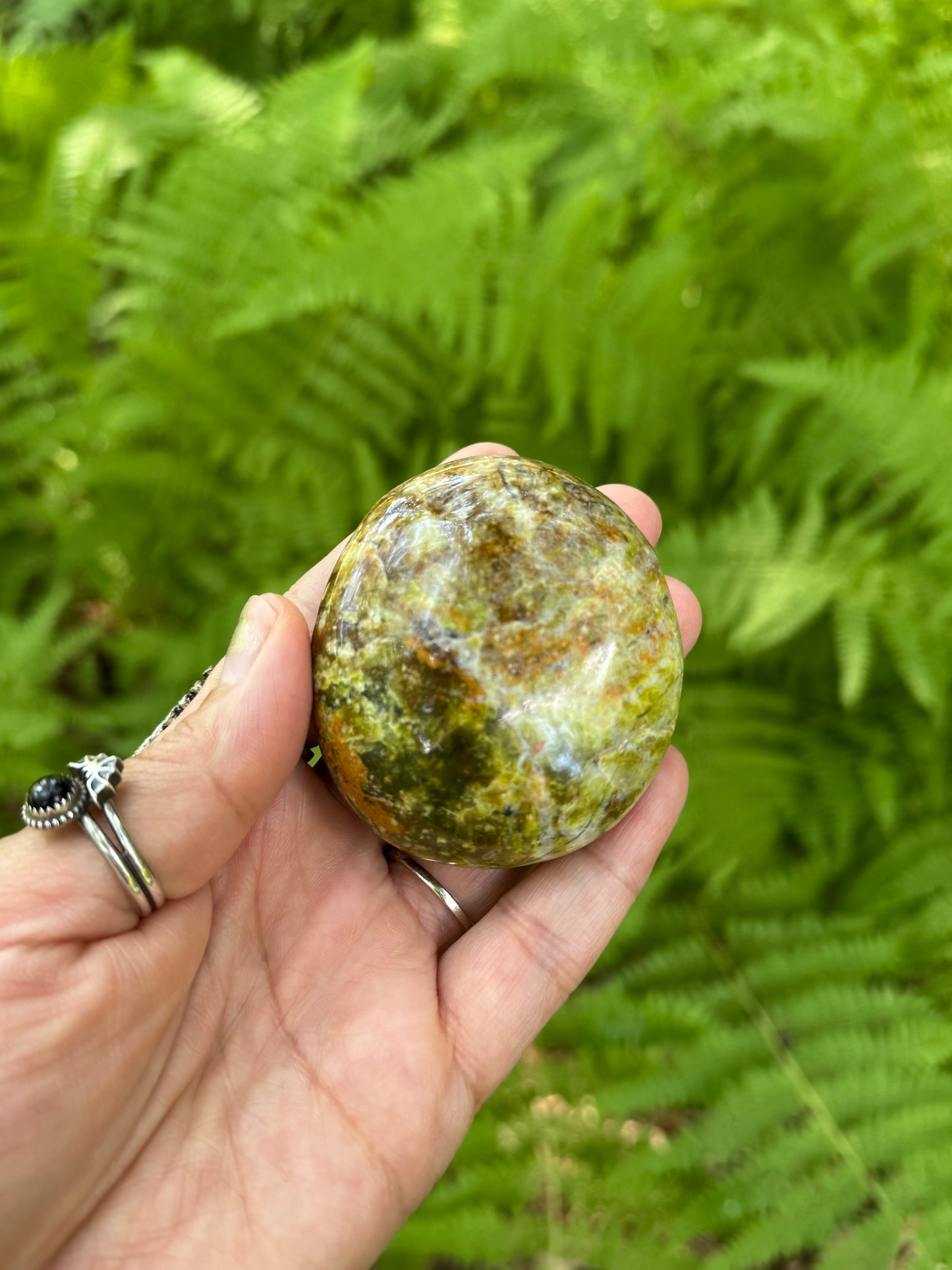 Green opal palm stone