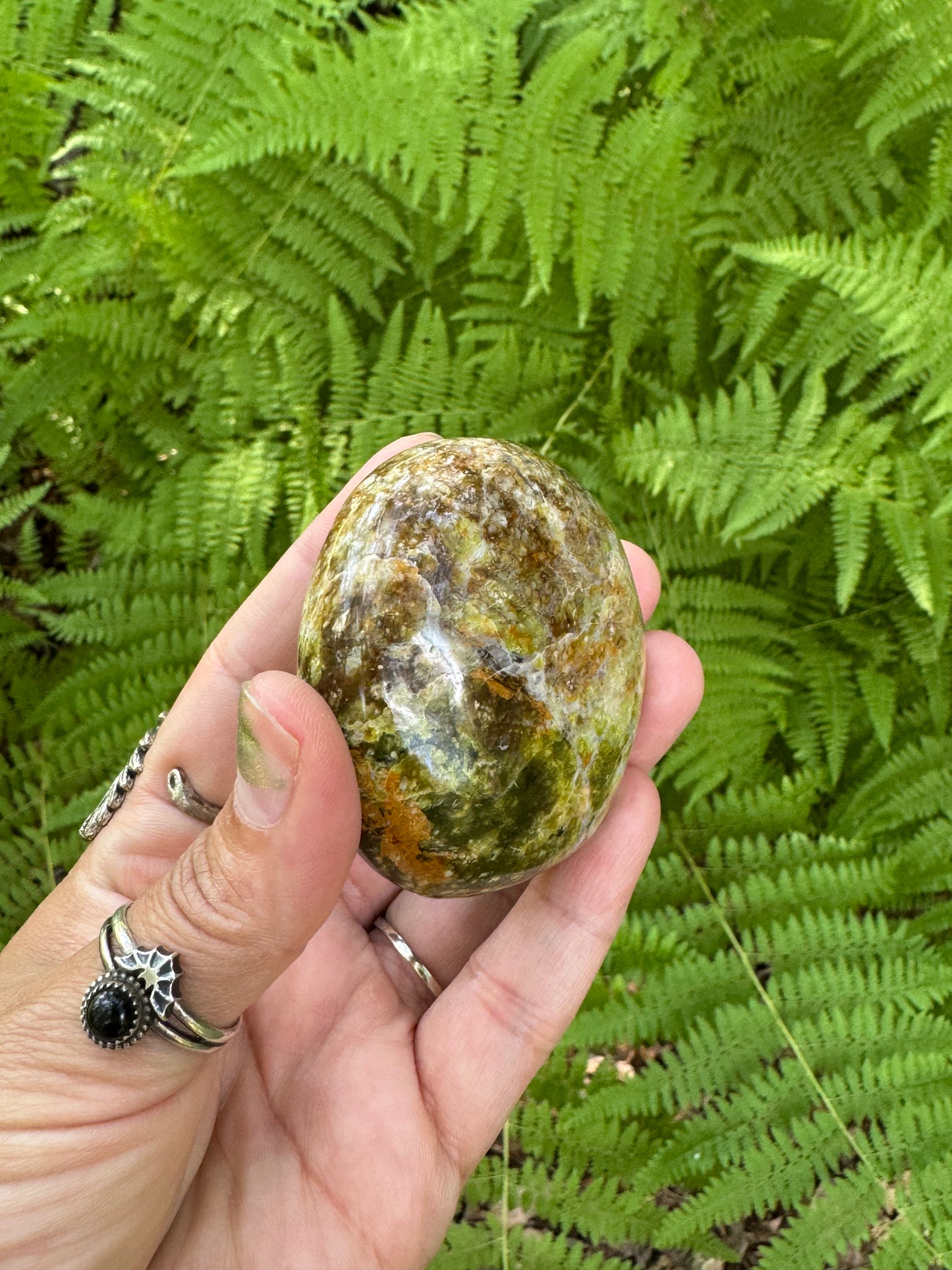 Green opal palm stone