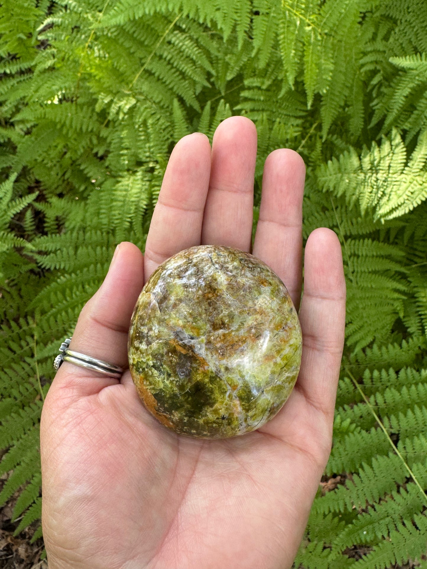 Green opal palm stone