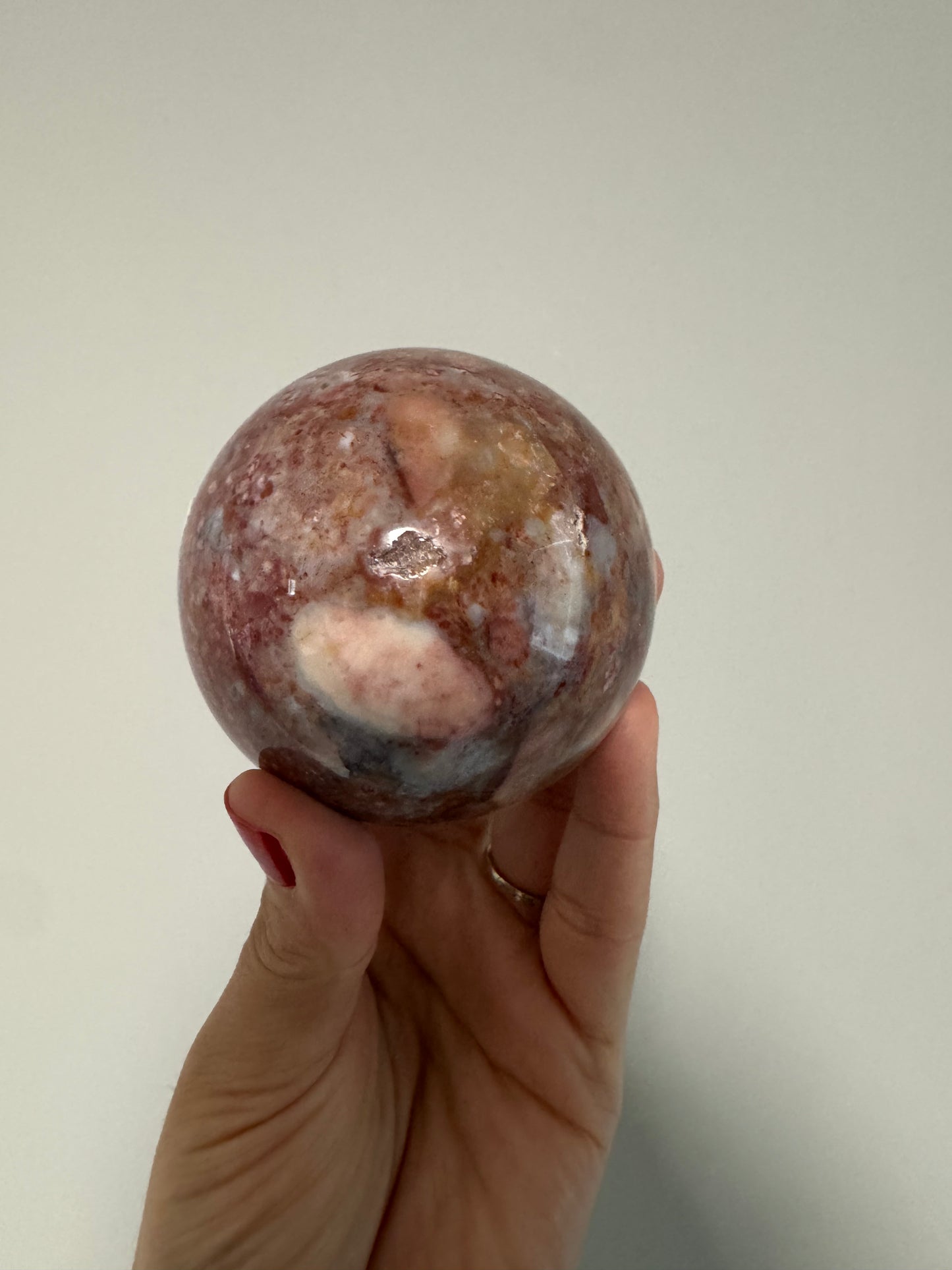 Petrified wood and quartz crystal sphere