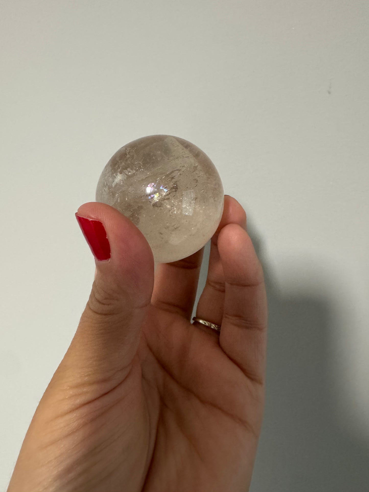 Petrified wood and quartz crystal sphere