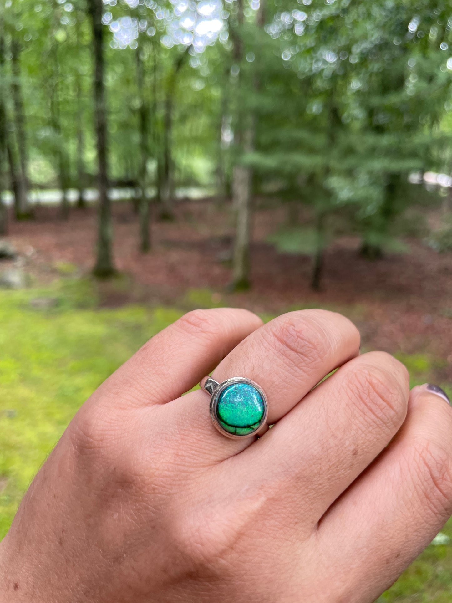 Circular monarch opal ring